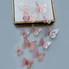 Decoración de mariposa de papel con simulación tridimensional 3D, accesorios de joyería de mariposa hueca tridimensional con textura metálica, pegatinas de pared para el hogar al por mayor