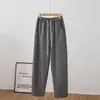 Foto real de calças largas estilo foice, novo estilo outono e inverno, versátil, simples, cintura elástica, padrão espinha de peixe, calças compridas esportivas casuais para mulheres