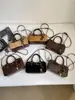 2026 Nova Bolsa Boston Retro de Camurça e Veludo Feminina de Alta Qualidade para o Dia a Dia com Alça Única de Mão e Transversal Versátil Fashion