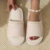 Nuevos zapatos de mujer de encaje de estilo étnico para comercio exterior transfronterizo, moda, medias zapatillas, zapatos de algodón en stock, zapatillas de lino para interiores de otoño e invierno