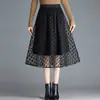 Falda de malla flocado, nuevo modelo otoño 2026, longitud media, falda de cintura alta a la moda, nueva falda de línea A, falda de tul con dobladillo ancho