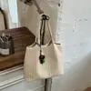 Bolso tote tejido Shuai Mi Jia para mujer, bolso de hombro de gran capacidad para el trabajo, nuevo bolso de mano casual moderno y sencillo 2026
