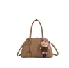 Bolsa de Mão Feminina Estilo Bowling Fashion Retrô 2026 Novo Modelo Luxo Leve Versátil de Ombro Transversal para o Dia a Dia