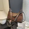 Bolsas de Camurça de Nicho Mais Vendidas Outono e Inverno 2025 Nova Bolsa Transversal Versátil para o Dia a Dia Bolsa de Ombro/Axila Feminina