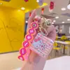 Sanliou Dibujo Animado Mini Cubo de Rubik Llavero al por Mayor Rompecabezas Colgante para Mochila Escolar Joyería Pequeña Llavero para Pareja Colgante