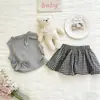 Conjunto de Verano para Bebé Niña 2026 Nuevo Estilo Camiseta sin Mangas con Lazo para Niñas Falda Corta a Cuadros Falda Floral