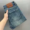 Outono de 2026 Nova Marca Moderna Jeans Azul de Alta Qualidade Masculino Estilo Outono Solto Versátil Marca Moderna Casual Calças Compridas