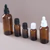 Frascos de vidro marrom para óleos essenciais de 5ml 10ml 30ml, personalizados de fábrica, frascos conta-gotas âmbar à prova de luz disponíveis com tampas
