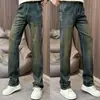Calça jeans masculina estilo americano vintage, novo modelo 2026, corte solto, calça reta com lavagem retrô, bolsos com lapela, calça longa casual
