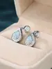 Suprimento de desejos transfronteiriços joias de platina feminina Aobao brincos Aobao em forma de gota personalidade da moda suporte uma geração de cabelo