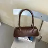 Bolsa de Hombro Minimalista Dulce de Nicho Coreano para Mujer Otoño Temprano 2026 Nuevo Bolso de Hombro Individual Casual Bolso Baguette para el Trabajo