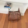 Otoño 2026 Nuevo Elegante Textura Simple Color Sólido Bolso de Hombro Cruzado Cadena Casual de Nicho Bolso de Mano Bolso Mujer