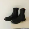 Botas curtas elásticas de comércio exterior transfronteiriças para outono e inverno, bico redondo versátil, salto grosso, sola macia, botas femininas pretas emagrecedoras, botas marrons da moda
