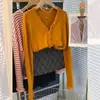 Cárdigan de punto holgado con cuello en V y manga larga, con diseño calado y volantes, color amarillo primavera, para mujer, que combina con el tono de piel, de Dongdaemun, Corea