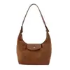 Bolso de Gamuza de Lujo tipo Dumpling para Mujer 2026 Nueva Moda para el Trabajo y el Viaje Diario Gran Capacidad Bolso de Hombro Único Cruzado