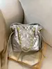 Bolso de hombro único con cadena de diamantes de alta gama para mujer, nuevo y elegante bolso cruzado de lujo ligero 2026, bolso tipo cubo versátil para el trabajo