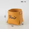 Porta bolígrafos de escritorio de oficina de lujo ligero Caja de almacenamiento para controles remotos y artículos varios Cesta de almacenamiento de cuero para cosméticos de cuidado de la piel