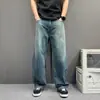 Jeans reto solto estilo retrô americano com aspecto desgastado para homens e mulheres, com caimento simples e corte curvo wide-leg, novo modelo 2026