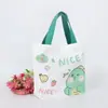 Bolso lindo de estilo caricatura nuevo para mujer, una opción elegante y moderna para mamás que salen o van al trabajo, con un diseño japonés y un tamaño pequeño adecuado para llevar el almuerzo.