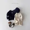 Pantalones vaqueros de estilo coreano de otoño para niños y niñas de 0 a 3 años, vaqueros infantiles versátiles de color liso suaves