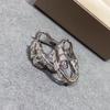 Pendientes de alta gama con diseño de hueso de serpiente y diamantes de imitación brillantes, ligeros y de lujo, de moda francesa, nuevos