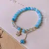 Pulsera de Madera de Sándalo Negra Dorada Natural con Cuentas Estilo Retro Elegante de Nicho Pulsera Simple y Versátil Joyería de Mano de Estilo Nacional de Gama Alta