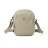 Bolso para teléfono móvil de mujer 2025 verano nuevo modelo tres capas mini bolsa pequeña monedero para teléfono móvil nailon impermeable portátil bolso de hombro