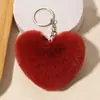 Llavero Colgante Colgante de Peluche con Forma de Corazón de Imitación de Piel de Conejo Decoración para Llaves de Coche Lindo Regalo en Forma de Corazón para Mujeres
