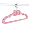Percha de plástico sin costuras en forma de lazo para almacenamiento, perchero creativo y lindo para dormitorio para abrigos de peluche y sudaderas