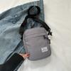 Bolsa casual lisa de tecido Oxford moda 2023 este ano popular bolsa de ombro transversal estilo ocidental porta-moedas bolsa para celular moda
