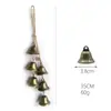Cuerda de cáñamo con campanas de venta caliente Cadena de campanas Trompeta vintage Carrillón de viento Arte de hierro Decoración colgante DIY Posada en casa Decoración de carillón de viento para el hogar Adorno colgante