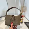 Bolso elegante y lujoso de estilo coreano, bolso cruzado sencillo para mujer, nuevo modelo 2026, bolso de hombro texturizado, bolso de gran capacidad para el día a día