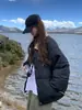 Chaqueta de algodón con relleno estilo chino de moda de Hong Kong para mujer, nueva de invierno 2026, abrigo de algodón grueso para petite, prenda exterior de nicho