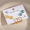 Brincos de Aço Inoxidável Cruzados Borboleta Conjunto de Três Peças para Mulheres Brincos Argola Redondos Olho de Demônio Simples Casual Temperamento Joia para Orelha
