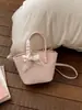 Bolso de Mano de Cuero Sintético, Nuevo Bolso Tote Pequeño Estilo Cesta de Moda, Fresco y Dulce, Bolso Versátil de Nicho de Gama Alta