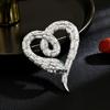 Nuevo estilo atmosférico de alta calidad con circonita de diamante completo en forma de corazón de serpiente, broche creativo de moda para chaqueta de traje, pin de solapa de animal