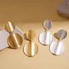Pendientes Redondos Geométricos Metálicos Cepillados Retro Europeos y Americanos con un Toque de Alta Gama, Personalidad Única, Pendientes Simples y Elegantes