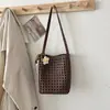 Bolsa de Palha Tecida Casual de Design Exclusivo para Mulheres 2026 Nova Bolsa de Grande Capacidade para o Dia a Dia Bolsa Personalizada de Ombro Único Transversal