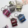 Mini Máquina de Frutas Llavero Colgante Juego de Darle Vueltas Máquina de Tigre LaBa Joyería Pequeña Sorteo Colgantes Decorativos