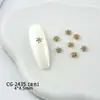 Acessórios Populares para Nail Art de Floco de Neve em Liga Metálica Dourada e Prateada, Decorações Tridimensionais de Floco de Neve Usáveis para Unhas Venda por Atacado