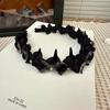Exquisita y elegante banda para el cabello negra para mujer, nueva moda 2024, estilo extranjero, ligera, de lujo, banda para la cabeza alta con forma de cráneo, tocado con tarjeta dentada