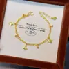 O Mesmo Estilo do da Loja Dourada, Pulseira de Estrela de Quatro Pontas e Trevo de Quatro Folhas com Gelo Triturado Brilhante para Mulheres, Joia de Pulseira de Camada Dupla de Luxo Leve e de Alta Qualidade