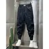 Pantalones pitillo cropped para hombre con cordón en el tobillo 2023 Verano nuevos con línea brillante overol personalizado pantalones tipo harén versátiles que estilizan