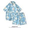 2023 verano para niños nueva camisa de manga corta estampada conjunto de dos piezas pantalones cortos de manga corta estilo Hong Kong traje de camisa floral hombres