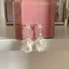 Pendientes de pétalos de estrella de mar estilo vacación en la playa, de alta gama y etéreos, pendientes versátiles con un toque de nicho, ambiente suave y fresco.