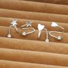 Aretes de rosca anti-pérdida aretes de doble capa aretes encantadores estrella femenina giratoria aretes de primavera aretes de alta gama femenino