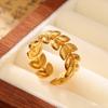 Anillo de acero inoxidable transfronterizo europeo y americano con textura de hojas doradas, elegante, moderno, sencillo, de alta gama, para mujer.