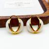 Pendientes de resina con diseño geométrico exagerado, estilo europeo y americano, ligeros, de lujo, de alta gama, con diseño de nicho personalizado, estilo retro, para primavera y verano, para mujer.