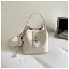 Bolsa de Cubo Portátil Shuai Mi Home para Mujer 2026 Nueva Moda Bolso de Hombro Sencillo para el Trabajo Diario y los Viajes Bolso Cruzado