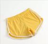 Pantalones cortos deportivos de comercio exterior para mujeres europeas y americanas, para el hogar, ocio, color sólido, moda, yoga, playa, pantalones cortos color caramelo